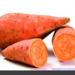 whole and halved sweet potatoes