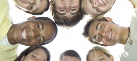 Teenagers Smiling in Group Hug