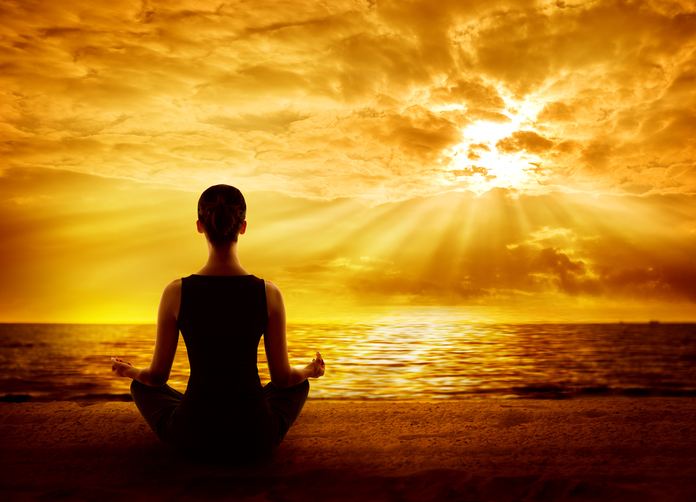 Yoga Meditating Sunrise, Woman Mindfulness Meditation in Nature, Back View on Beach