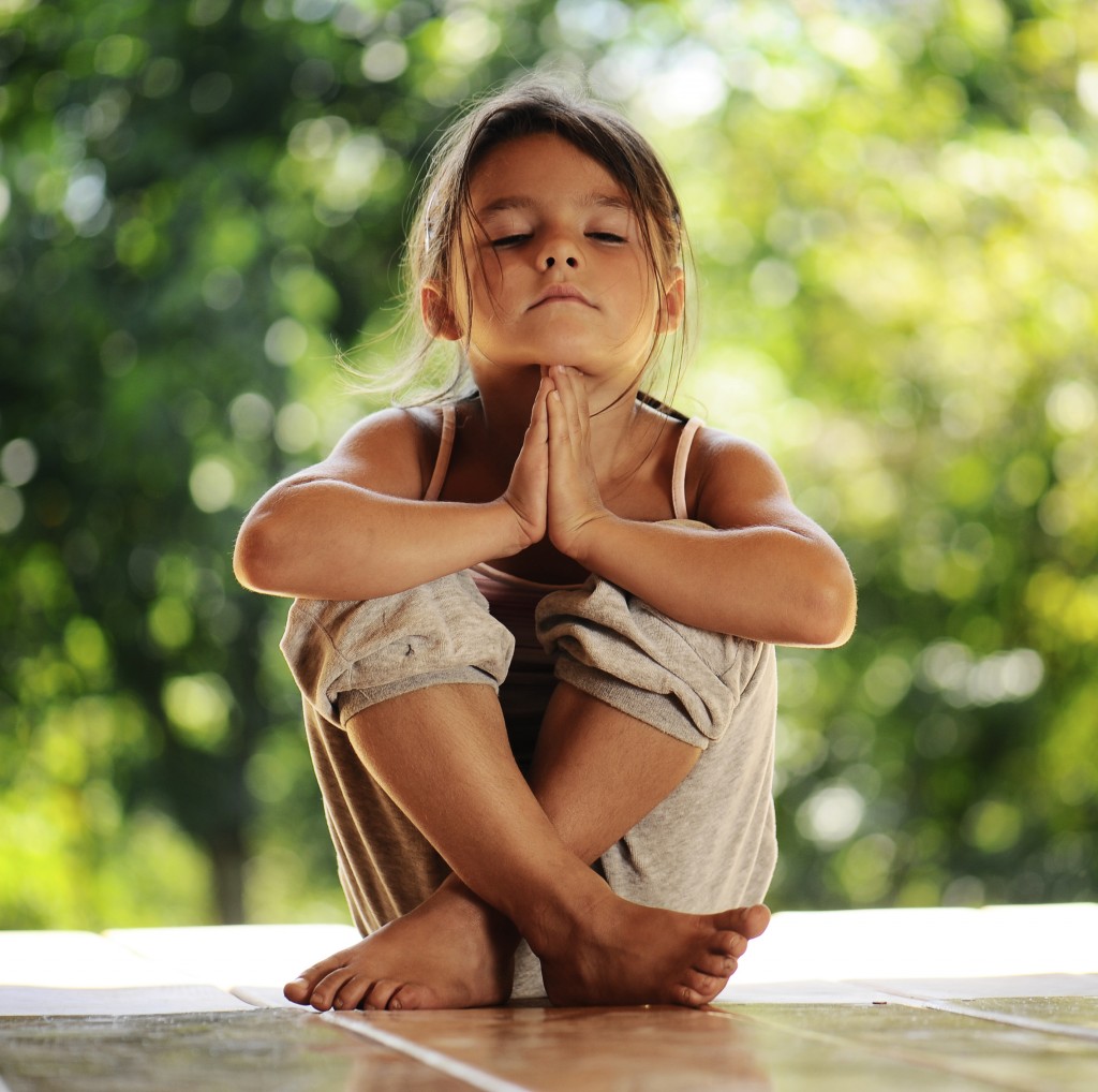 little girl meditating - Positive Life